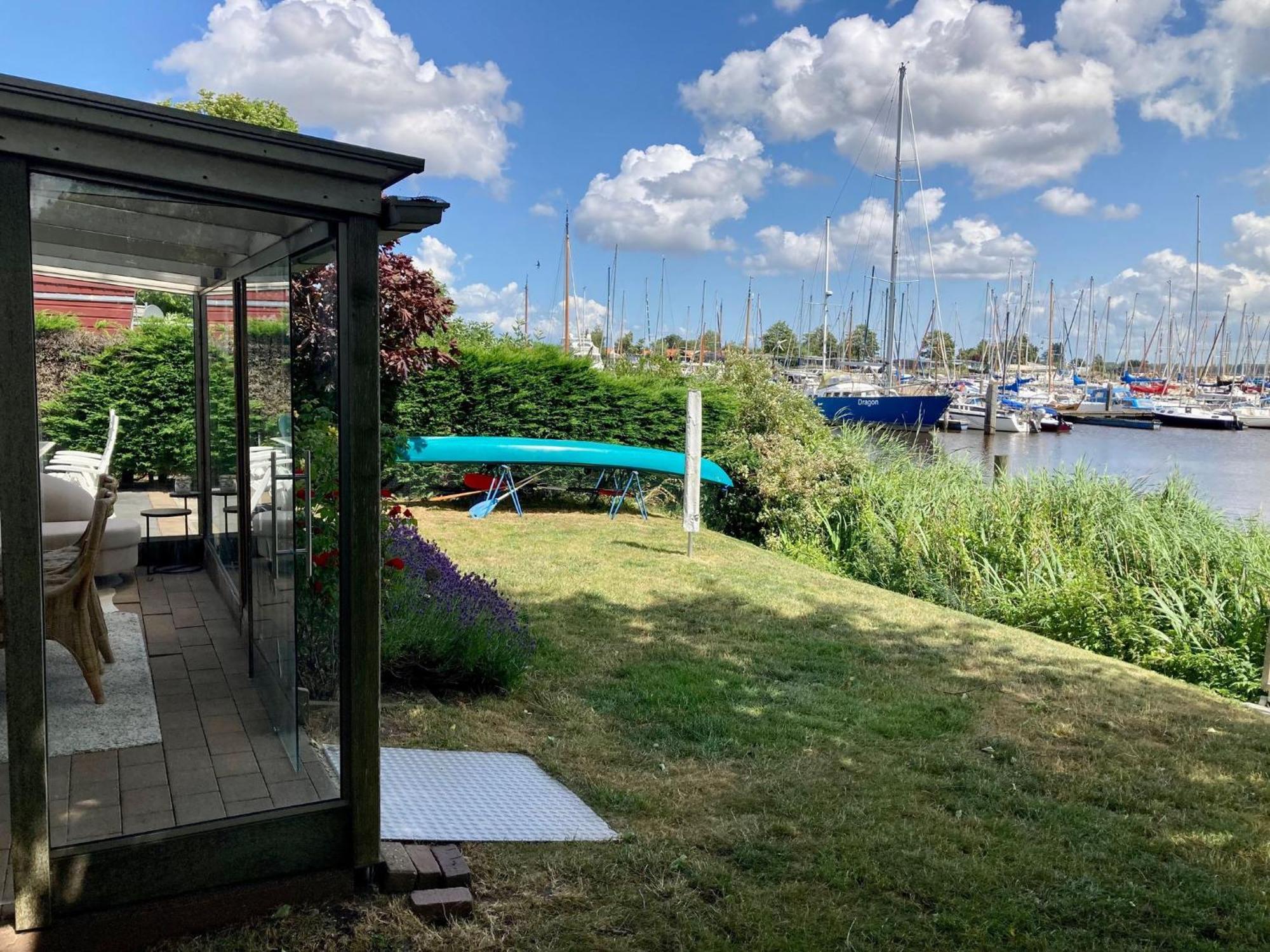 4 Pers Holiday Home Hilla With Winter Garden In Front Of The Dike Directly On The Lauwersmeer Anjum Bagian luar foto
